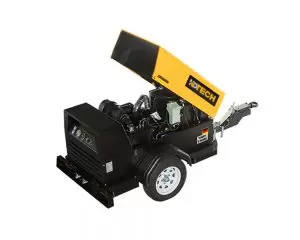 Low fuel consumption diesel air compressor operating at a construction site with eco-friendly features