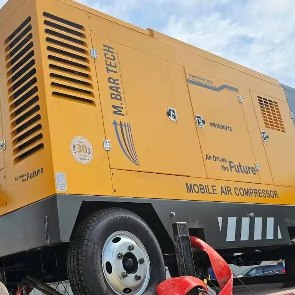 Kotech KDP-45/13 portable diesel screw air compressor operating in Negev Desert at 53°C with cyclone pre-cleaner and oversized cooling package